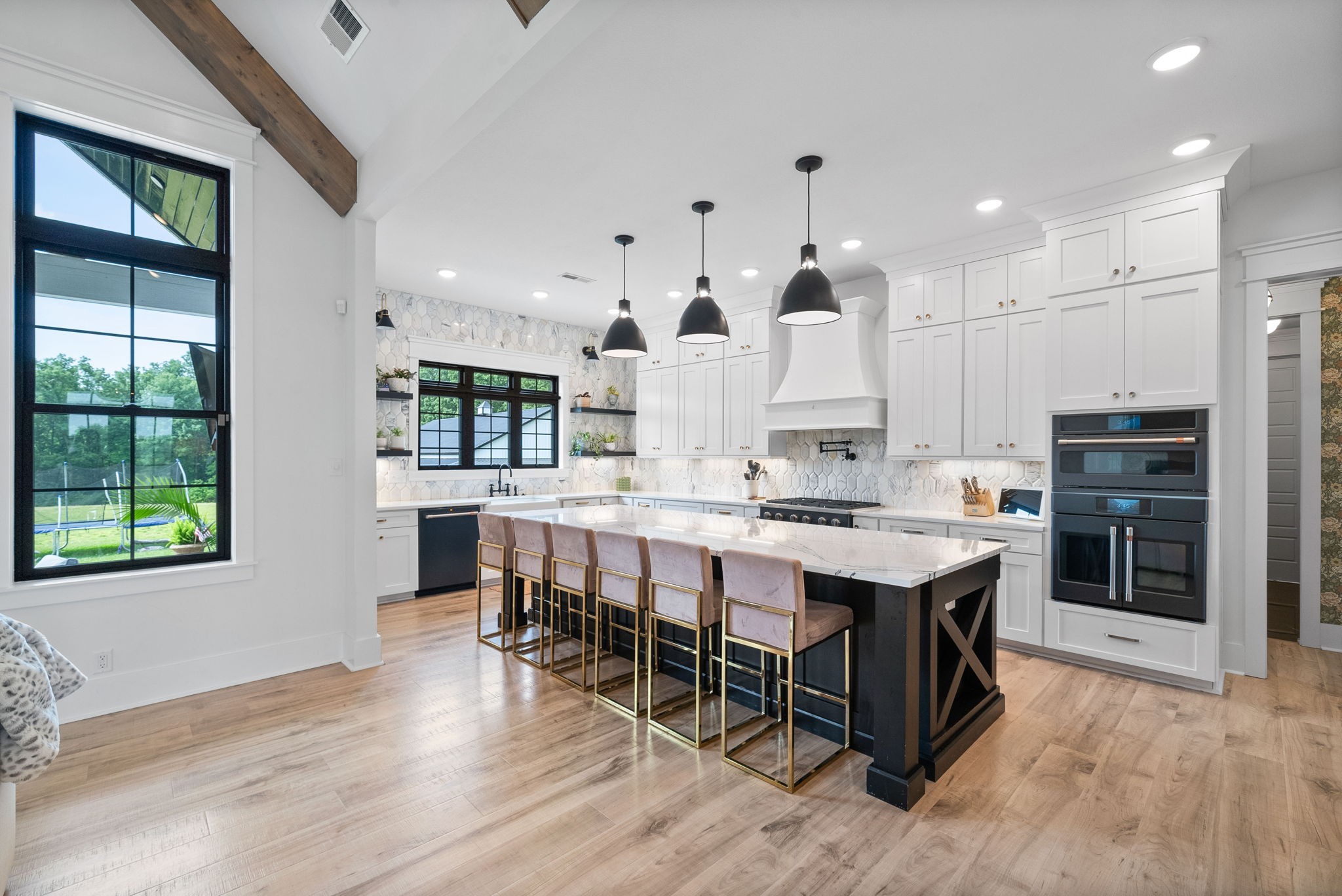 2480 Jarrell Ridge Road Clarksville, TN 37043 - Photo 18 of 69 a large kitchen with kitchen island a sink table and chairs