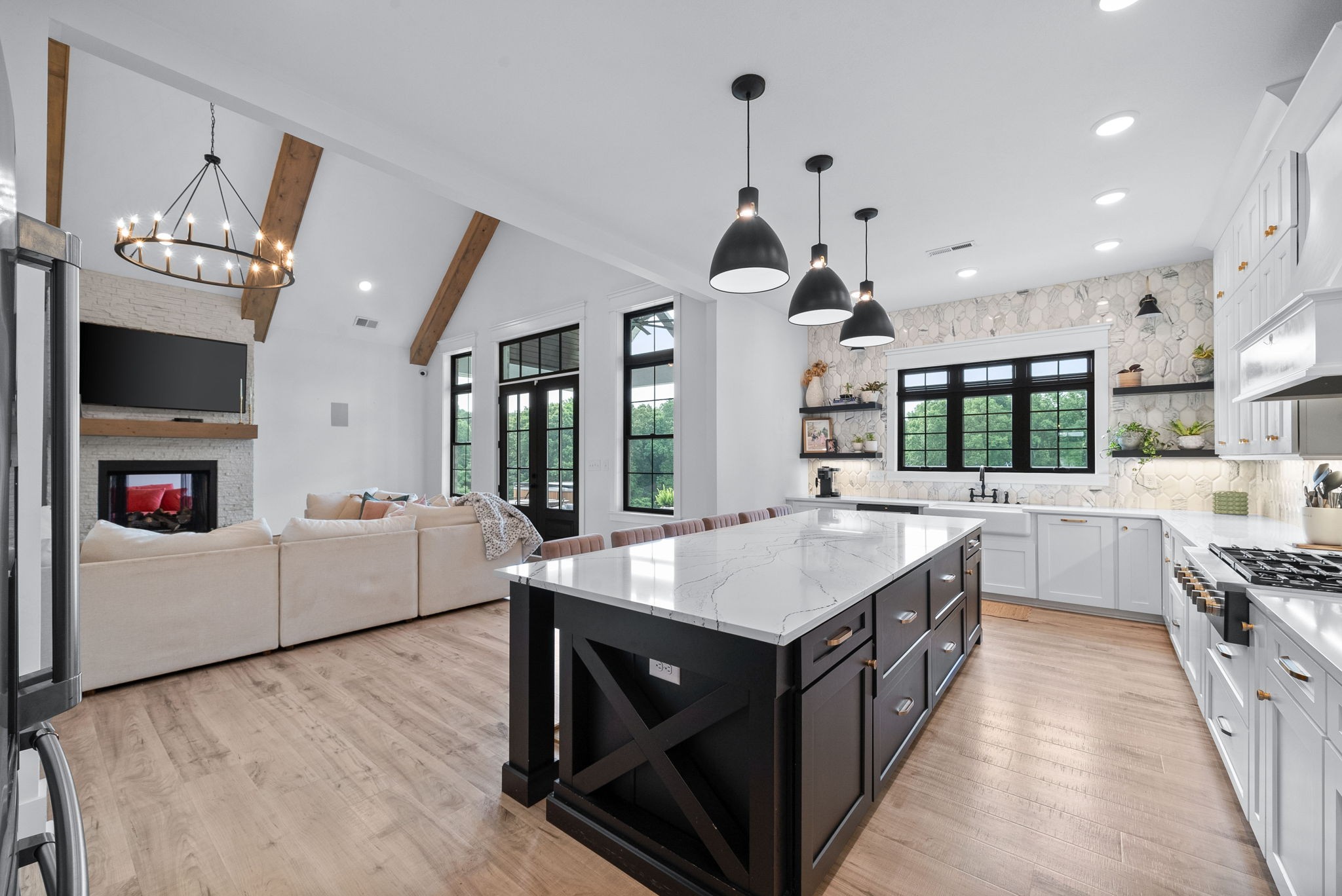 2480 Jarrell Ridge Road Clarksville, TN 37043 - Photo 19 of 69 a kitchen with a stove a sink and a refrigerator