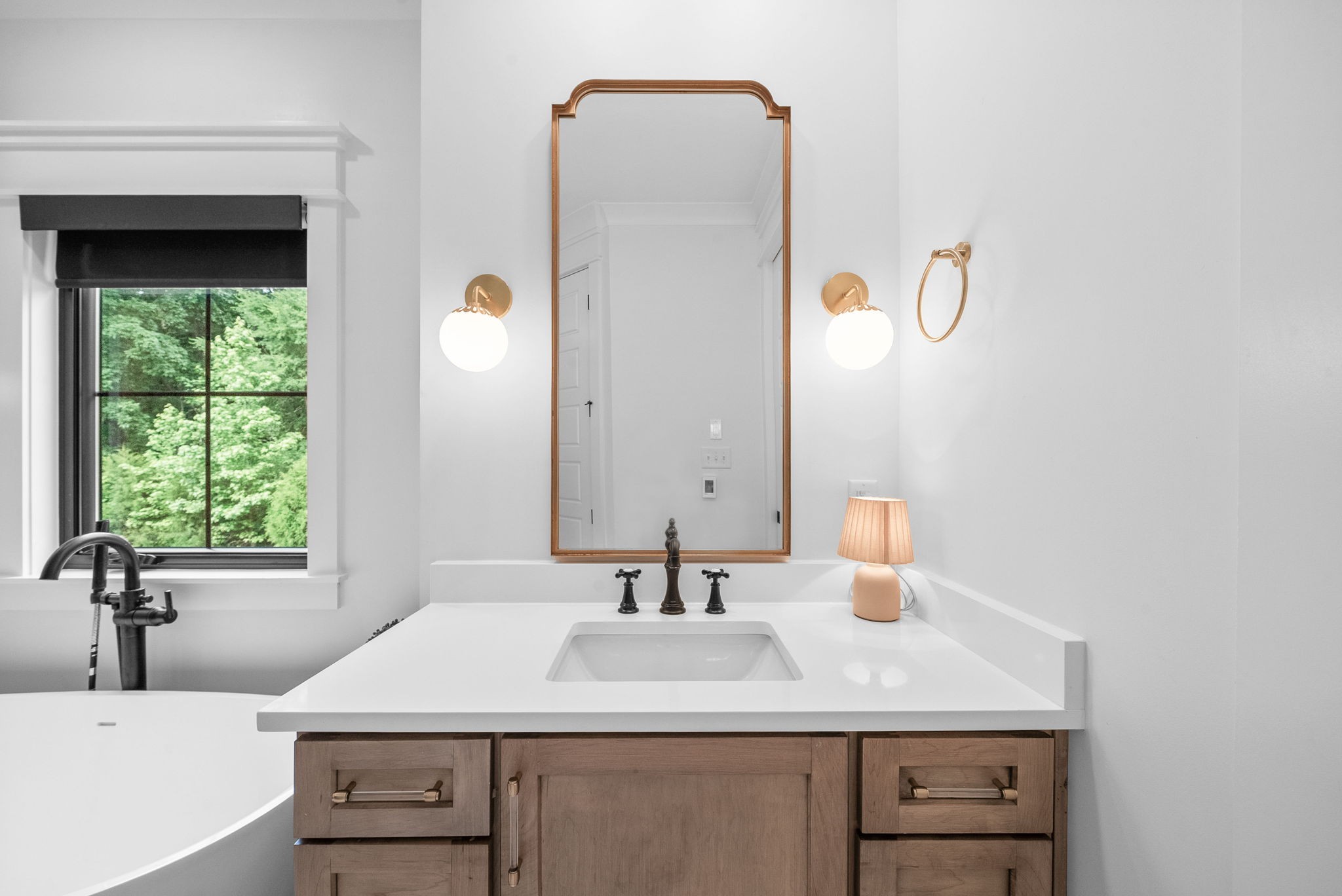 2480 Jarrell Ridge Road Clarksville, TN 37043 - Photo 30 of 69 a bathroom with a sink and a mirror