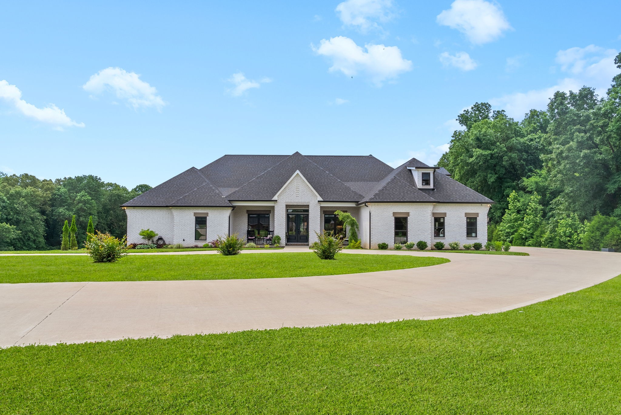 2480 Jarrell Ridge Road Clarksville, TN 37043 - Photo 3 of 69 a front view of a house with a yard and garage