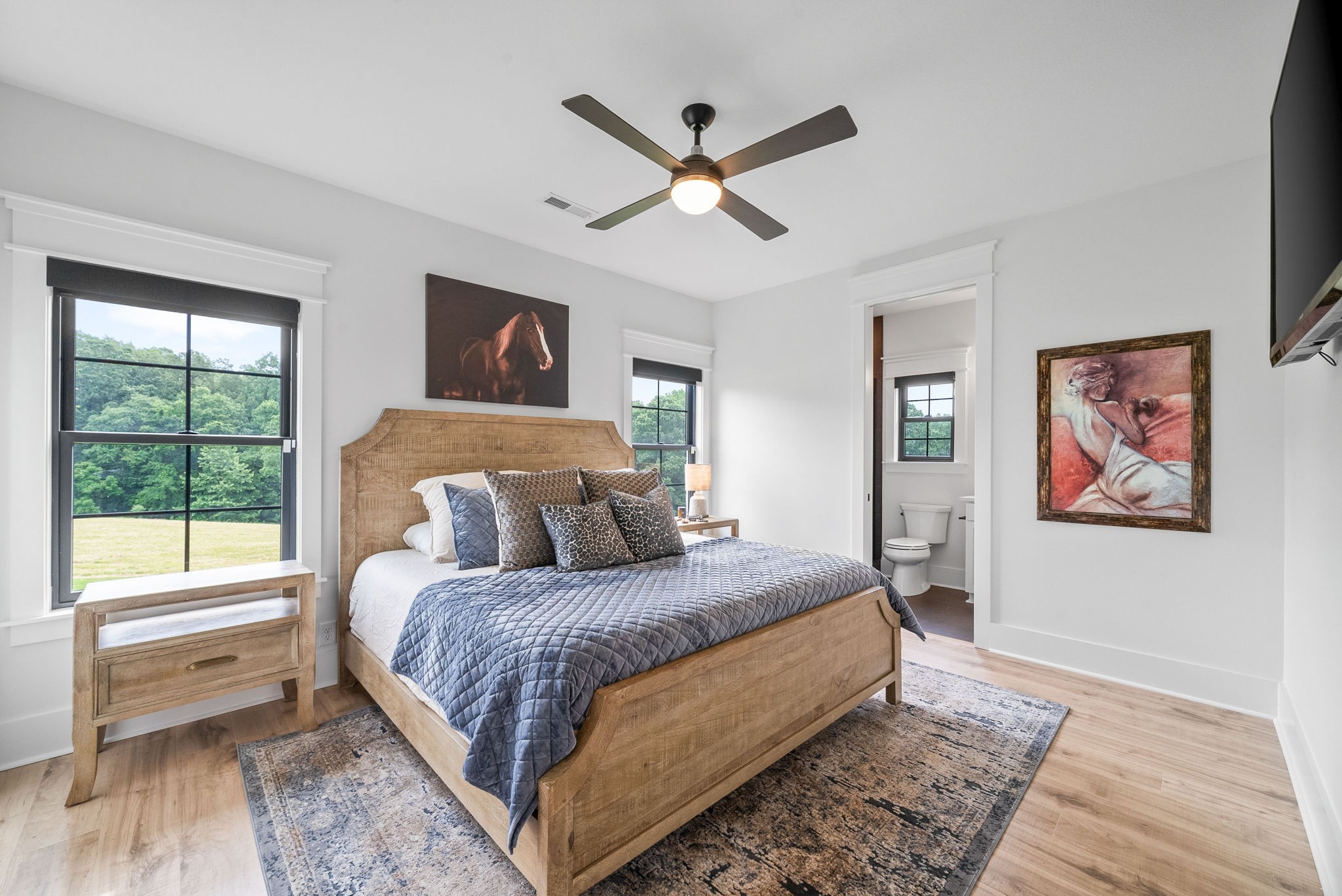 2480 Jarrell Ridge Road Clarksville, TN 37043 - Photo 38 of 69 a bedroom with a large bed and a window