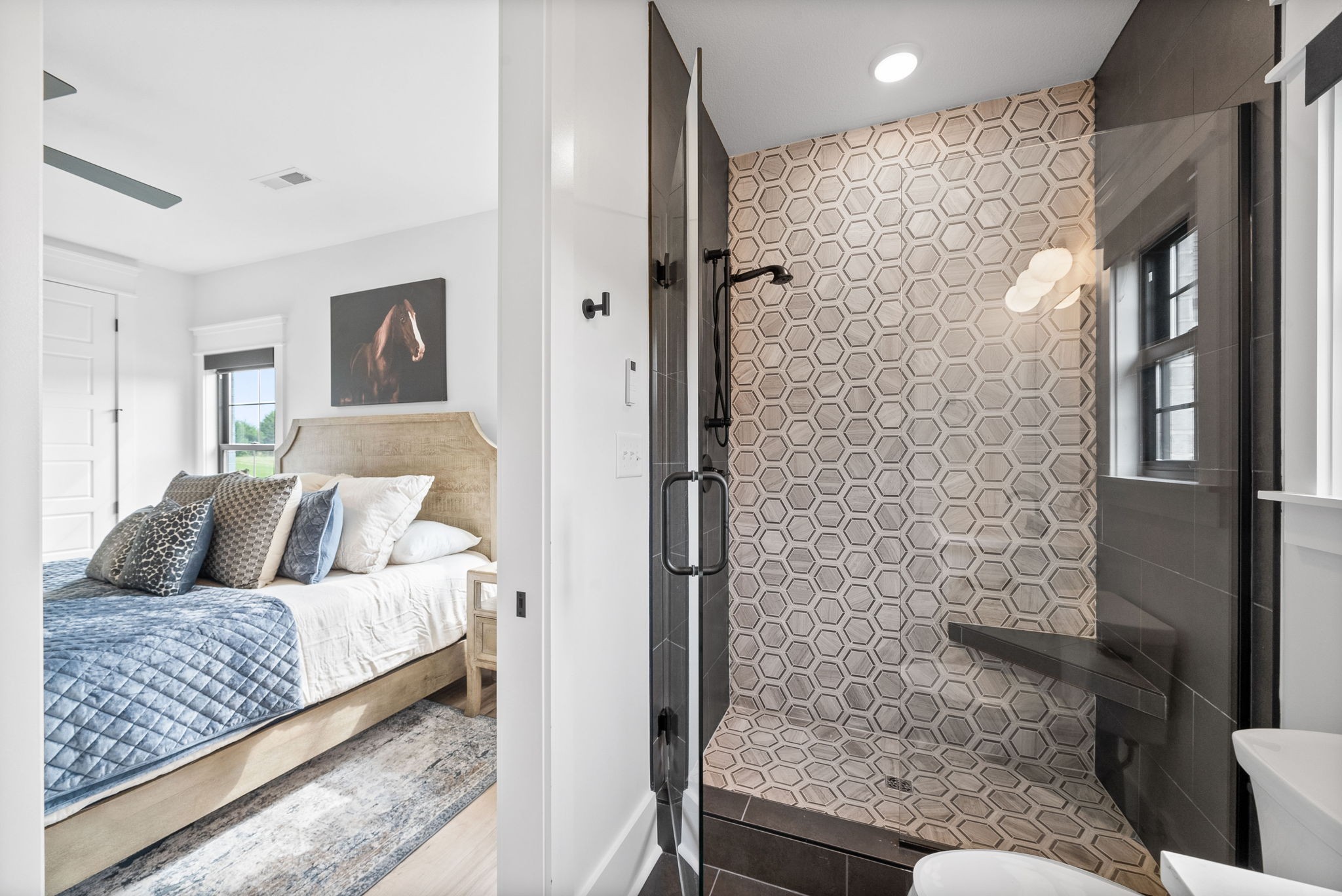 2480 Jarrell Ridge Road Clarksville, TN 37043 - Photo 41 of 69 a bedroom with a bed and a painting on the wall