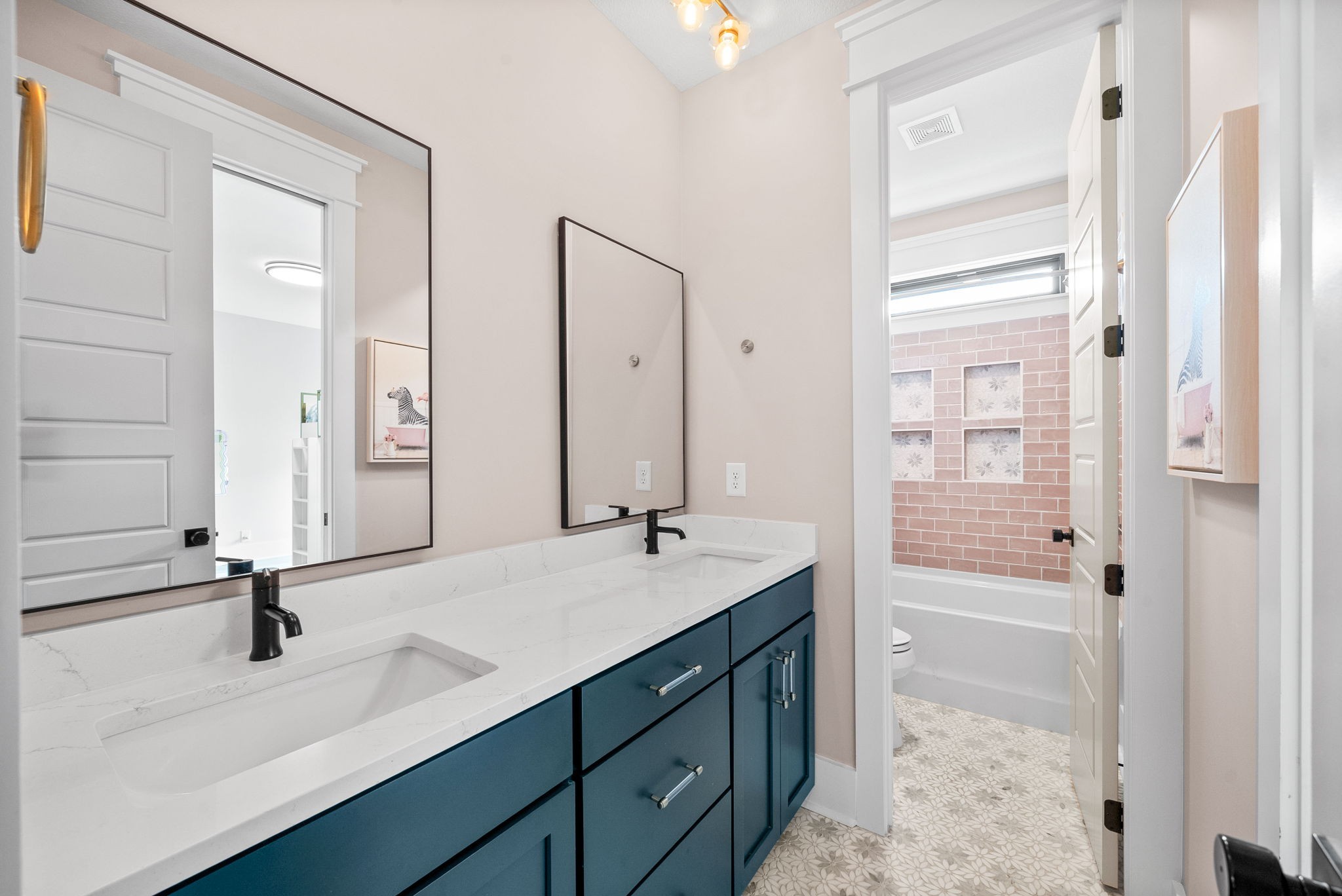 2480 Jarrell Ridge Road Clarksville, TN 37043 - Photo 43 of 69 a bathroom with a sink double vanity and a mirror