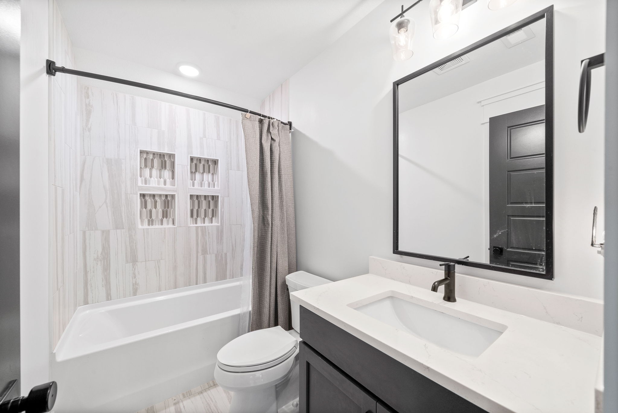 2480 Jarrell Ridge Road Clarksville, TN 37043 - Photo 52 of 69 a bathroom with a sink toilet and shower