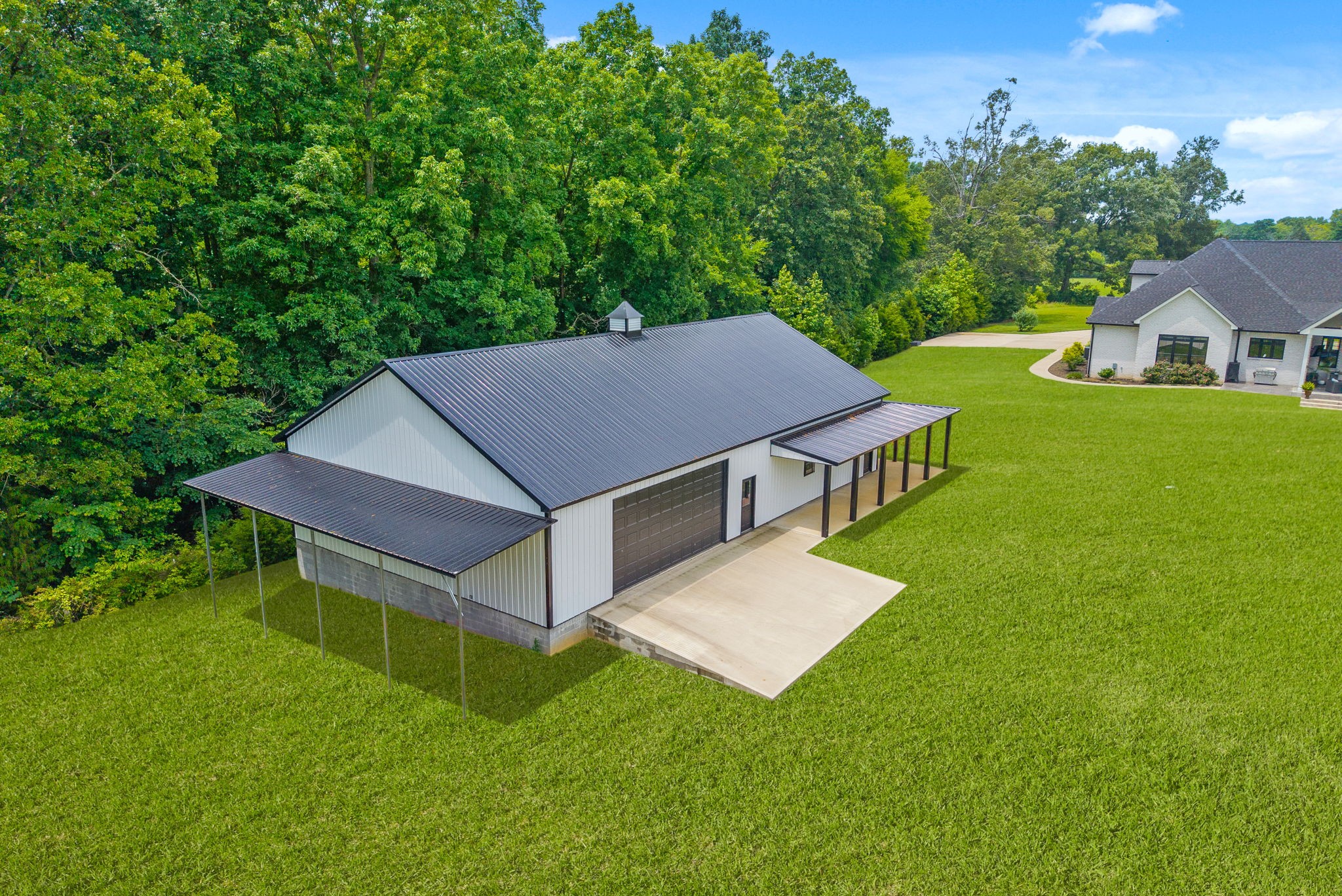 2480 Jarrell Ridge Road Clarksville, TN 37043 - Photo 60 of 69 aerial view of a house with a yard table and chairs