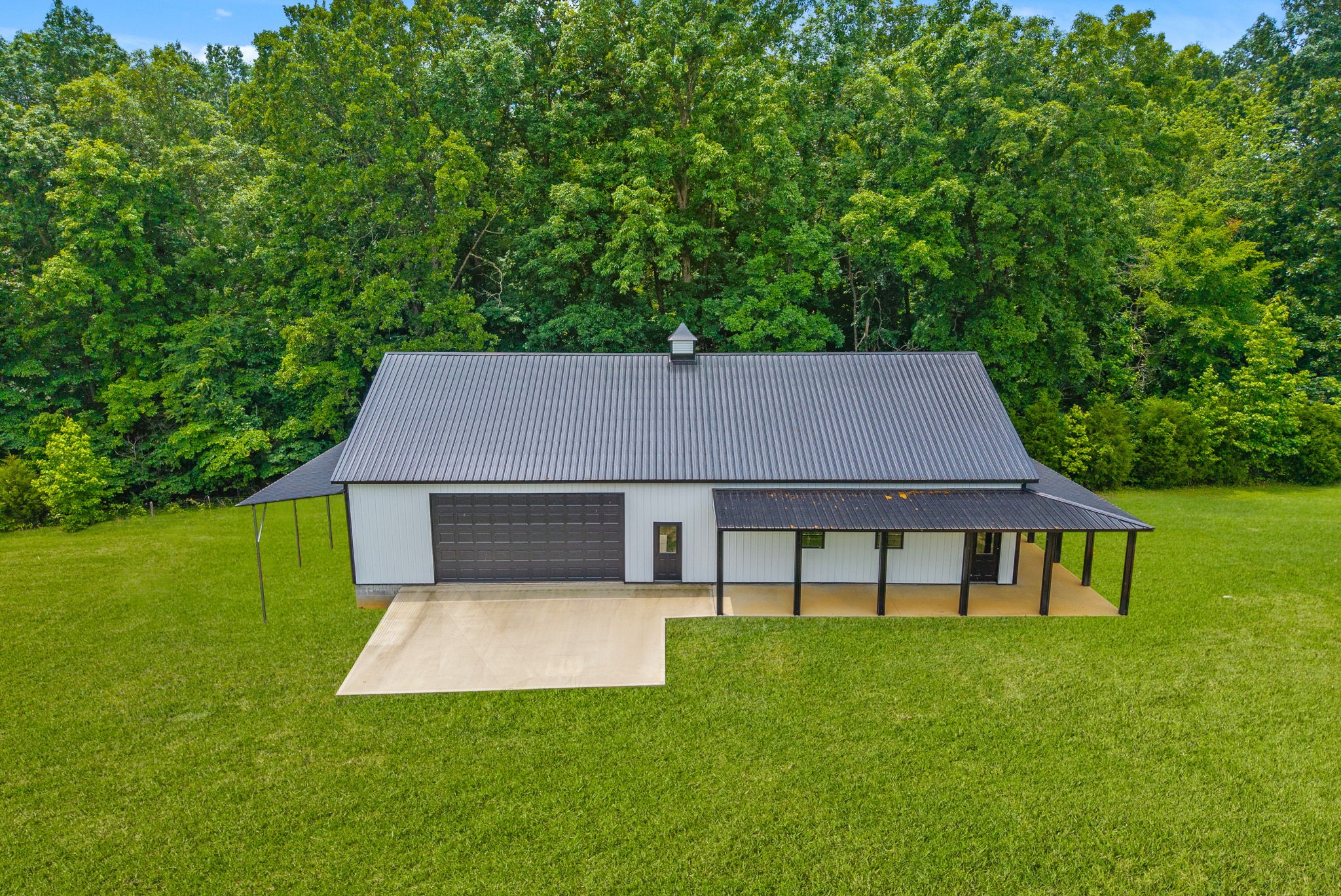 2480 Jarrell Ridge Road Clarksville, TN 37043 - Photo 61 of 69 a view of a house with a yard