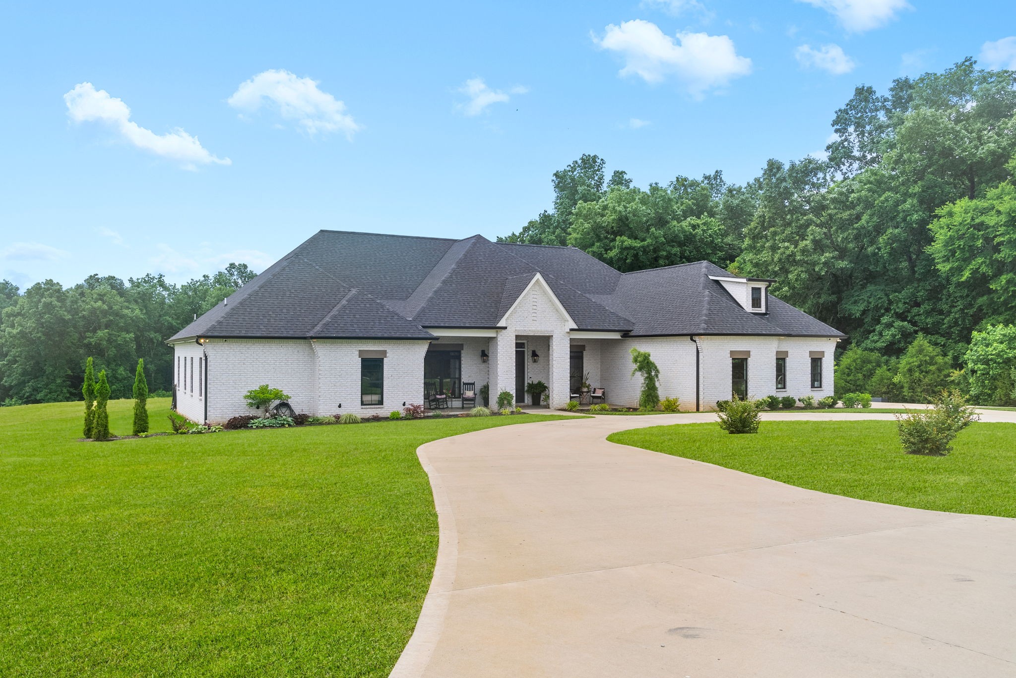 2480 Jarrell Ridge Road Clarksville, TN 37043 - Photo 68 of 69 a front view of a house with a yard and trees