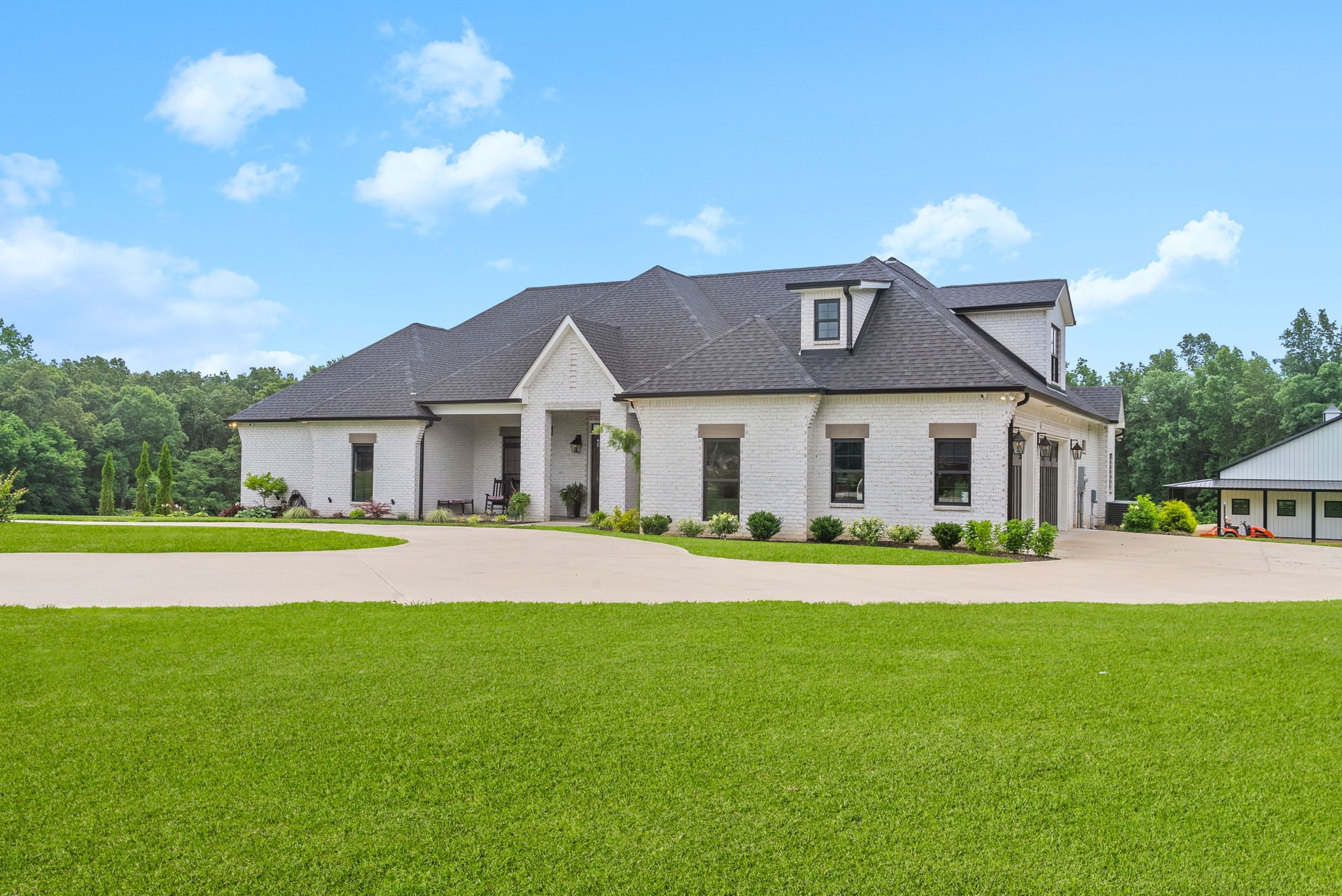2480 Jarrell Ridge Road Clarksville, TN 37043 - Photo 69 of 69 a front view of a house with a garden and yard