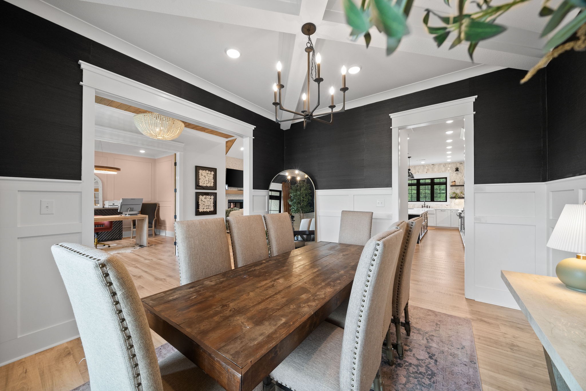 2480 Jarrell Ridge Road Clarksville, TN 37043 - Photo 7 of 69 a dining room with furniture a chandelier and wooden floor