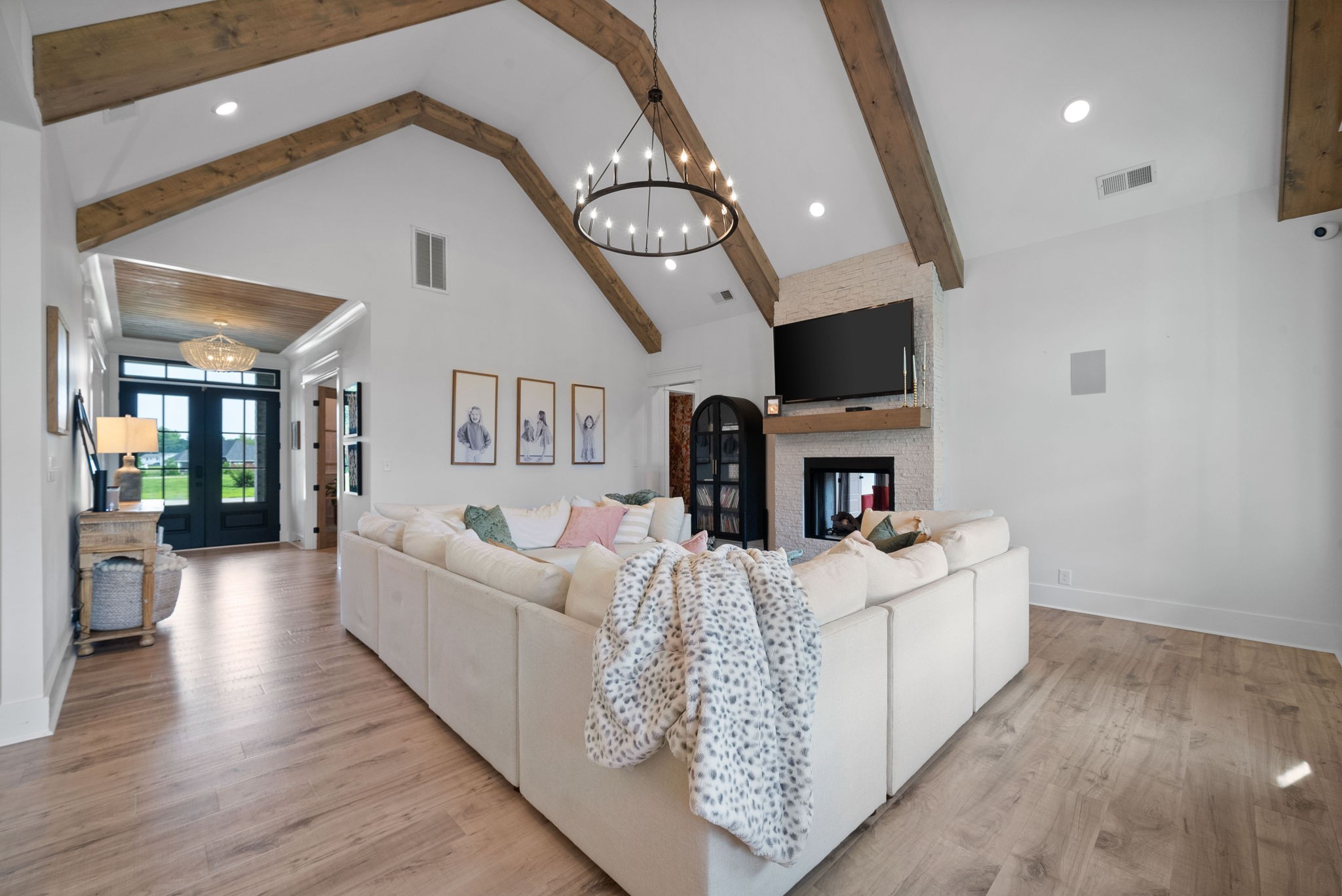 2480 Jarrell Ridge Road Clarksville, TN 37043 - Photo 10 of 69 a living room with fireplace furniture and a flat screen tv