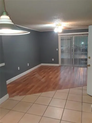 a view of a livingroom with a staircase