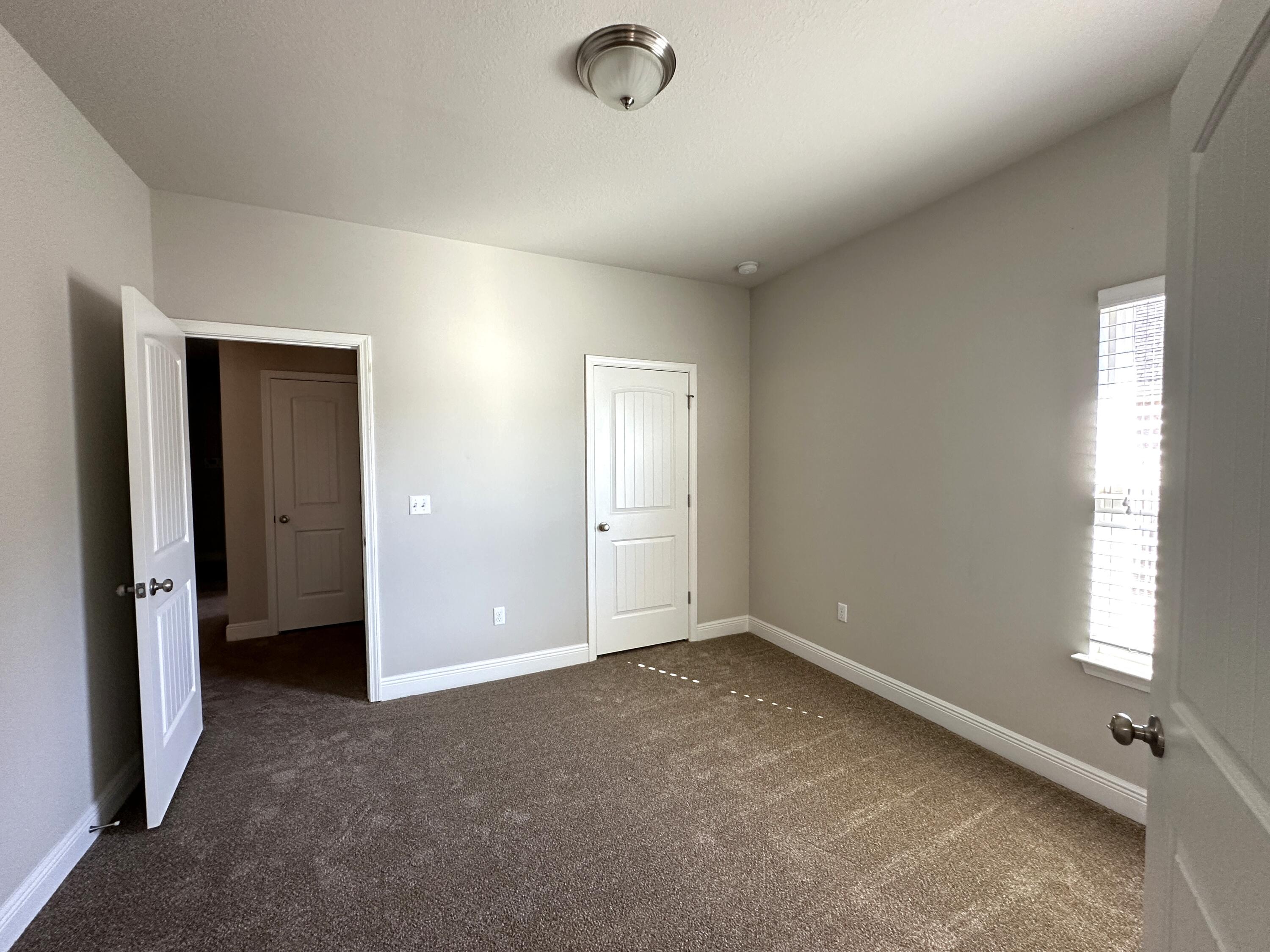 513 Gadwell Street Crestview, FL 32539 - Photo 25 of 35 a view of an empty room with a window