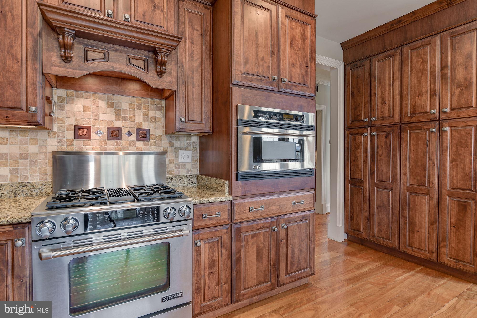 8728 Pete Wiles Road Middletown, MD 21769 - Photo 11 of 47 TUMBLED TRAVERTINE TILE W/CUSTOM WOOD ROSETTES