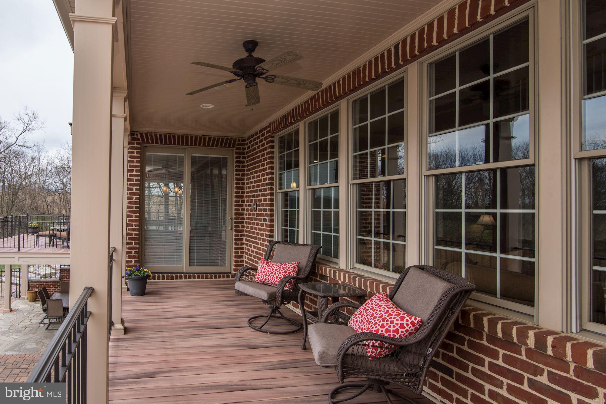 8728 Pete Wiles Road Middletown, MD 21769 - Photo 32 of 47 PORCH SEATING OVERLOOKS THE POOL, MEADOWS & MNTNS