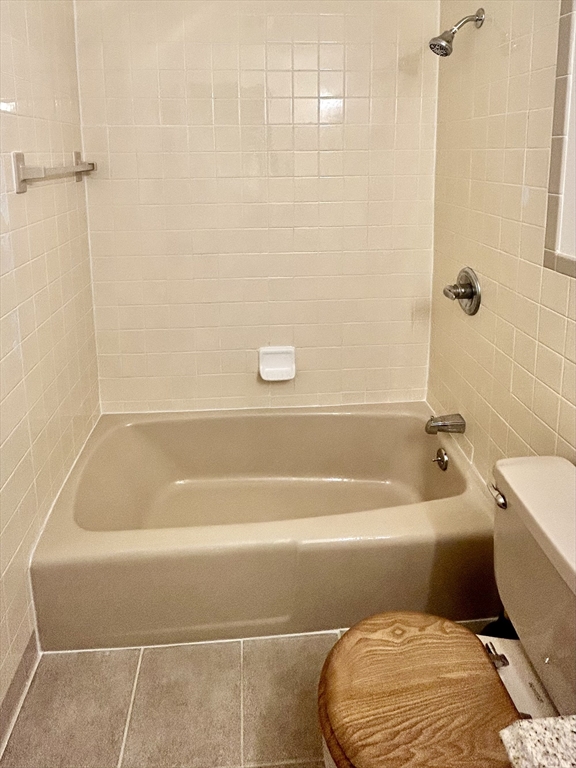 40 Corey Colonial, Unit 40 Agawam, MA 01001 - Photo 12 of 21 a bathroom with a toilet and a bath tub