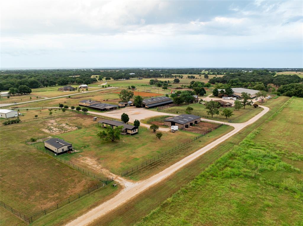 an aerial view of a houses with outdoor space