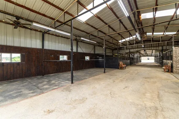 a view of swimming pool with a table and chairs