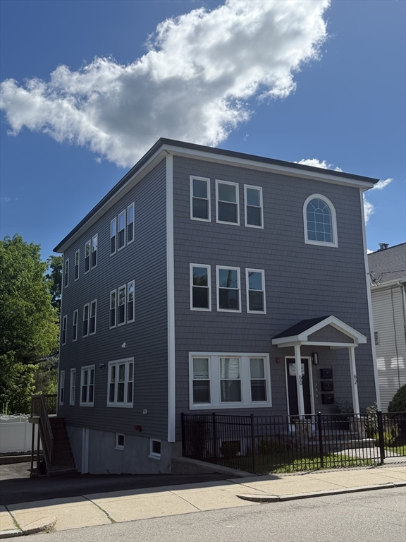 60-62 Wellsmere Road, Unit 2 Boston, MA 02131 - Photo 19 of 19 a front view of a house