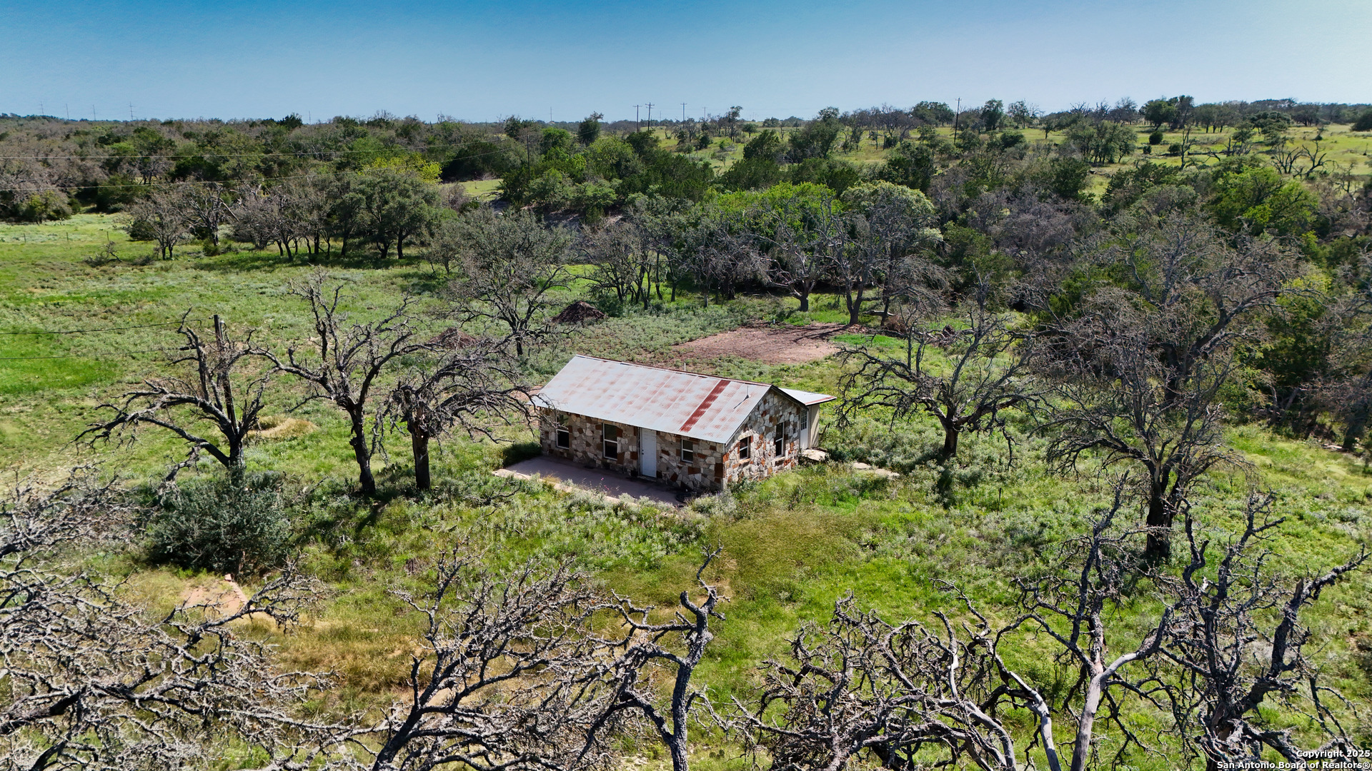 857 Dallas Josie Road Harper, TX 78631 - Photo 18 of 25 an aerial view of a house with a yard