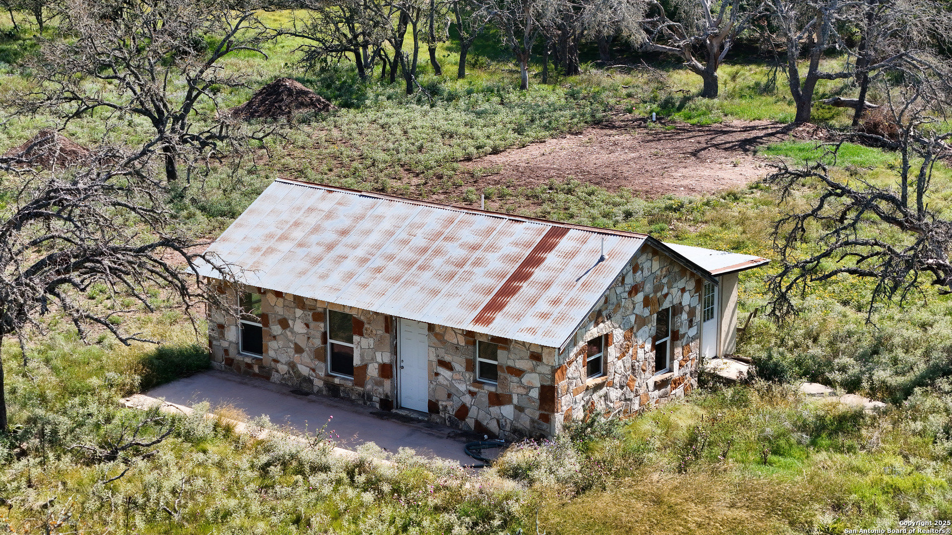 857 Dallas Josie Road Harper, TX 78631 - Photo 19 of 25 an aerial view of a house with a yard