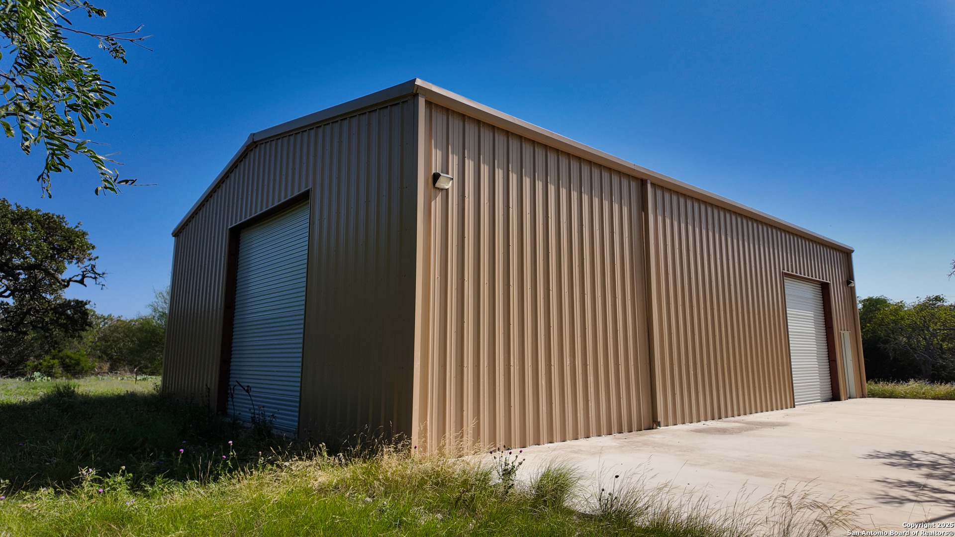 857 Dallas Josie Road Harper, TX 78631 - Photo 5 of 25 a front view of a house with garden