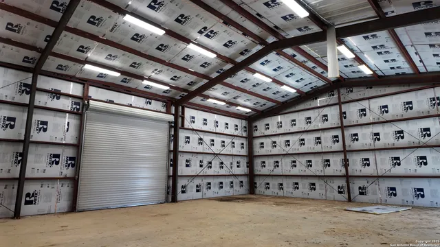 a view of a wooden chairs in a room