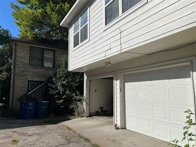 a view of a house with a garage