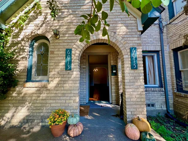 a front view of a house with patio