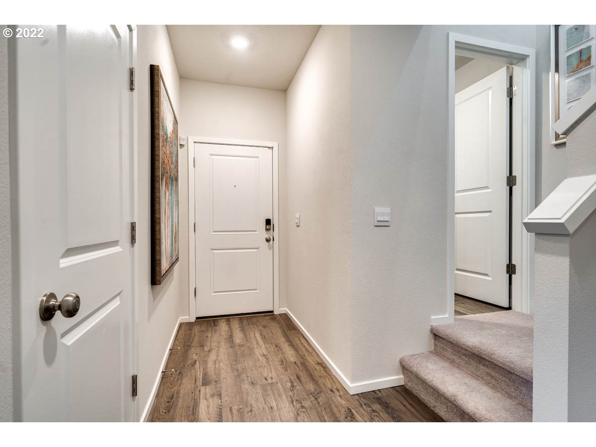 2892 V Street Springfield, OR 97477 - Photo 3 of 18 a view of an entryway with wooden floor