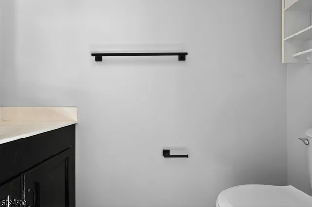 a bathroom with a toilet and a sink