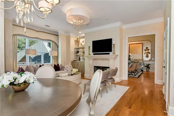 a bed room with a bed and a chandelier
