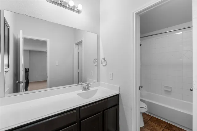 a bathroom with a sink and a bathtub