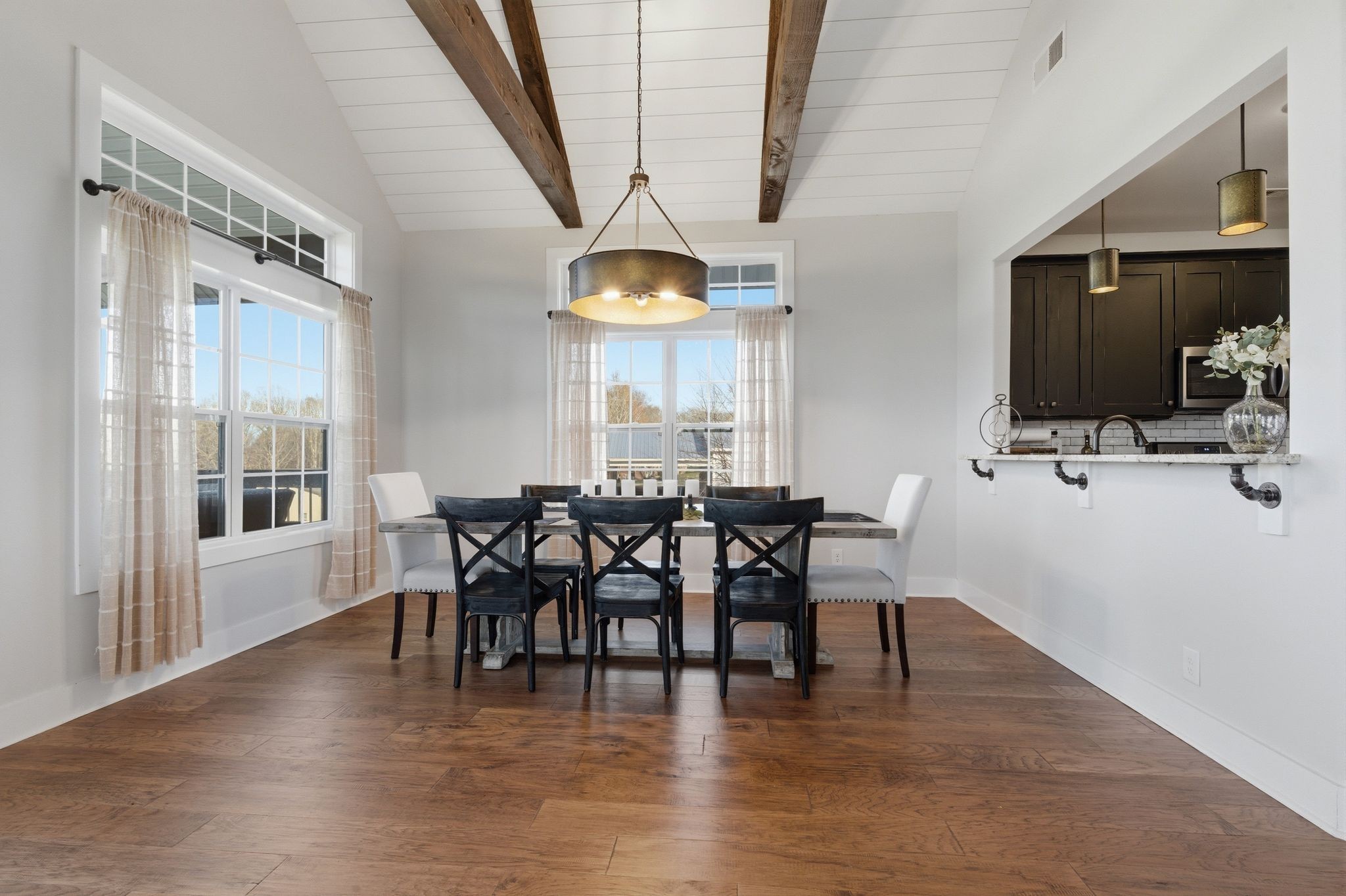 4041 Liverworth Road Southside, TN 37171 - Photo 16 of 63 a view of a dining room with furniture window and wooden floor