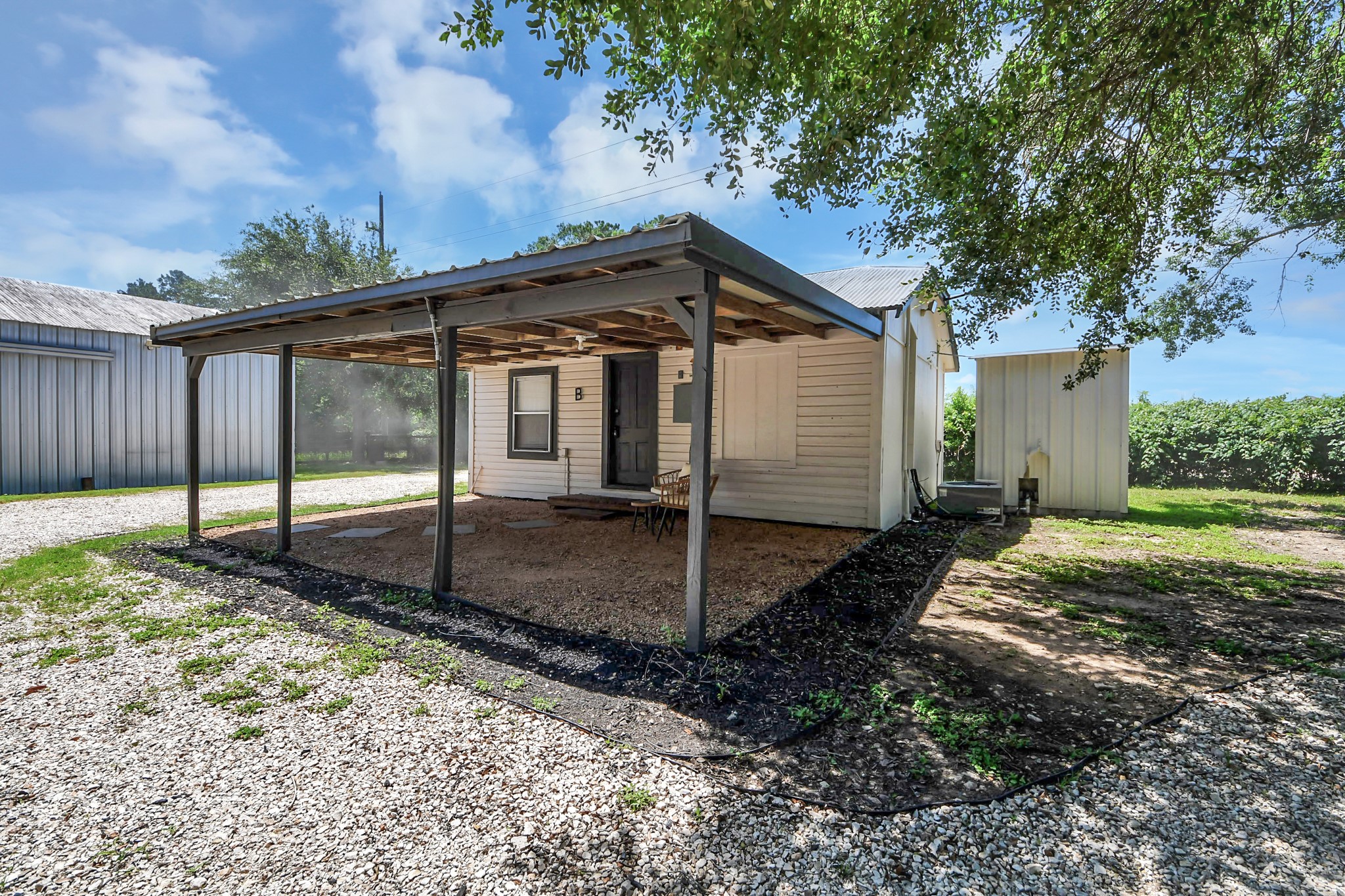 28222 Margerstadt Road Waller, TX 77484 - Photo 18 of 50 Covered outdoor space offers the perfect setting for relaxing, entertaining, or enjoying the countryside.