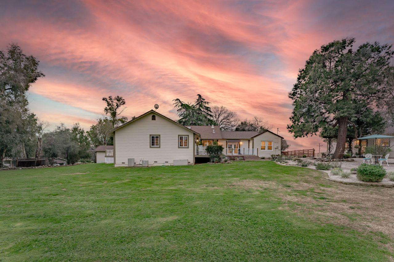 3740 Bell Road Auburn, CA 95602 - Photo 12 of 65 a view of a house with a big yard