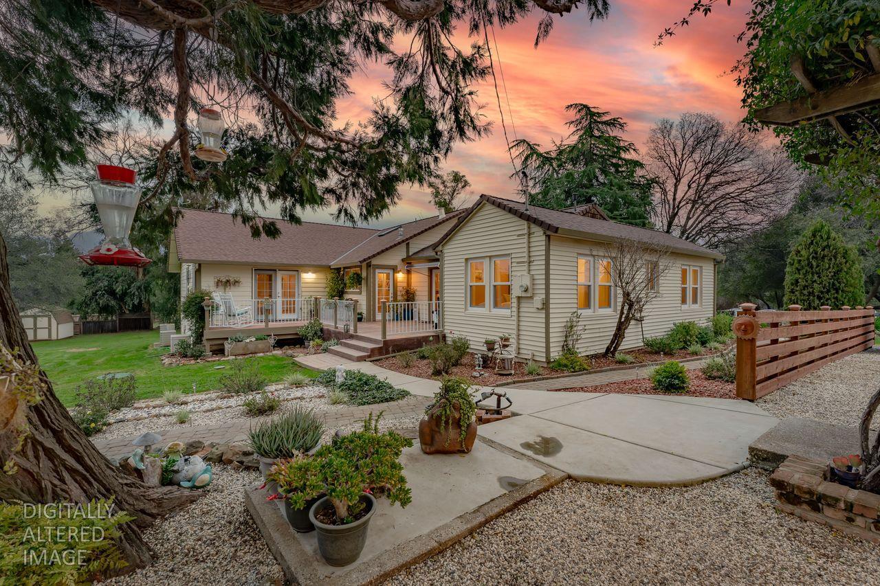 3740 Bell Road Auburn, CA 95602 - Photo 14 of 65 a view of a house with backyard and sitting area