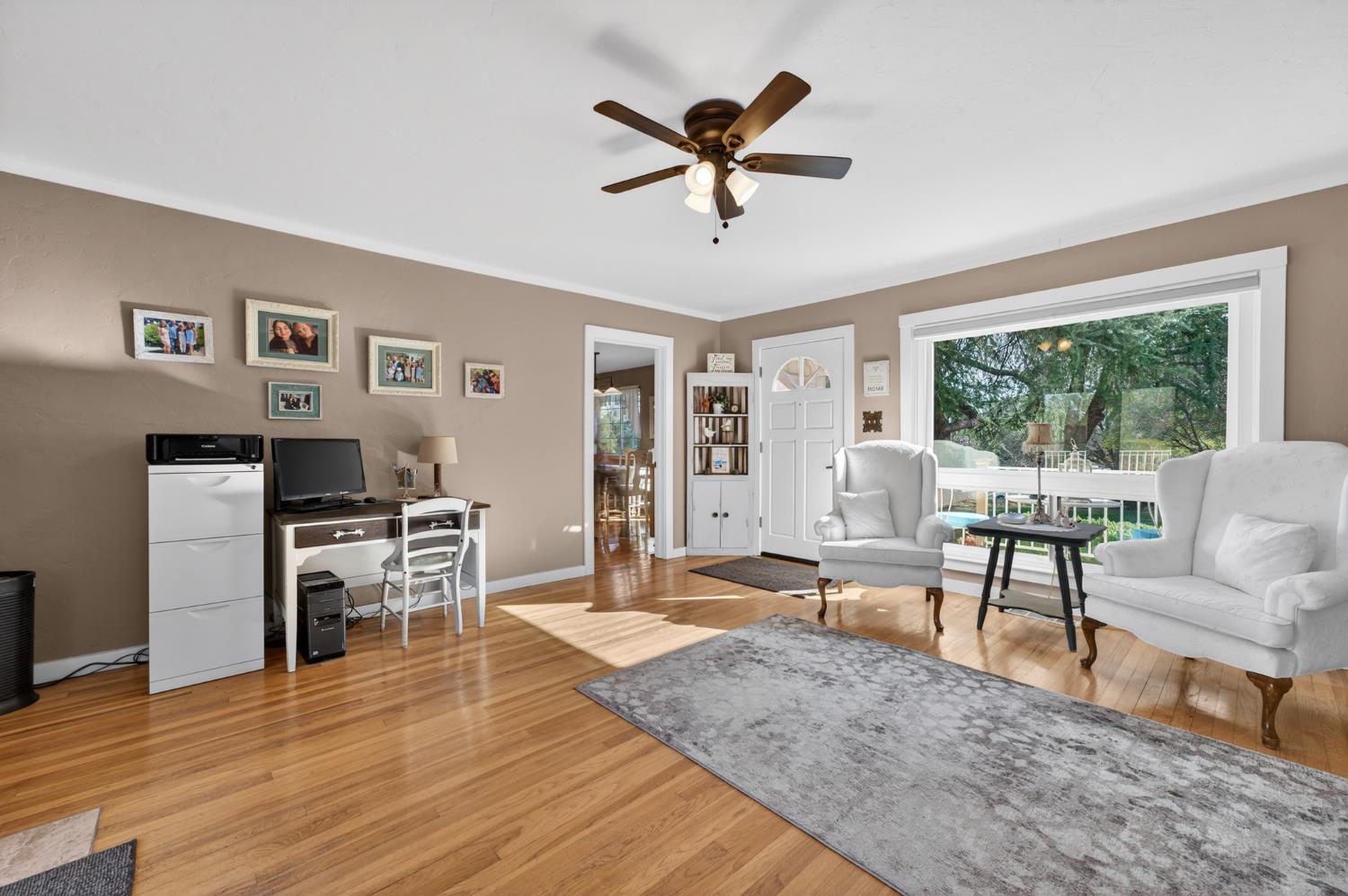3740 Bell Road Auburn, CA 95602 - Photo 25 of 65 a living room with furniture wooden floor and a window