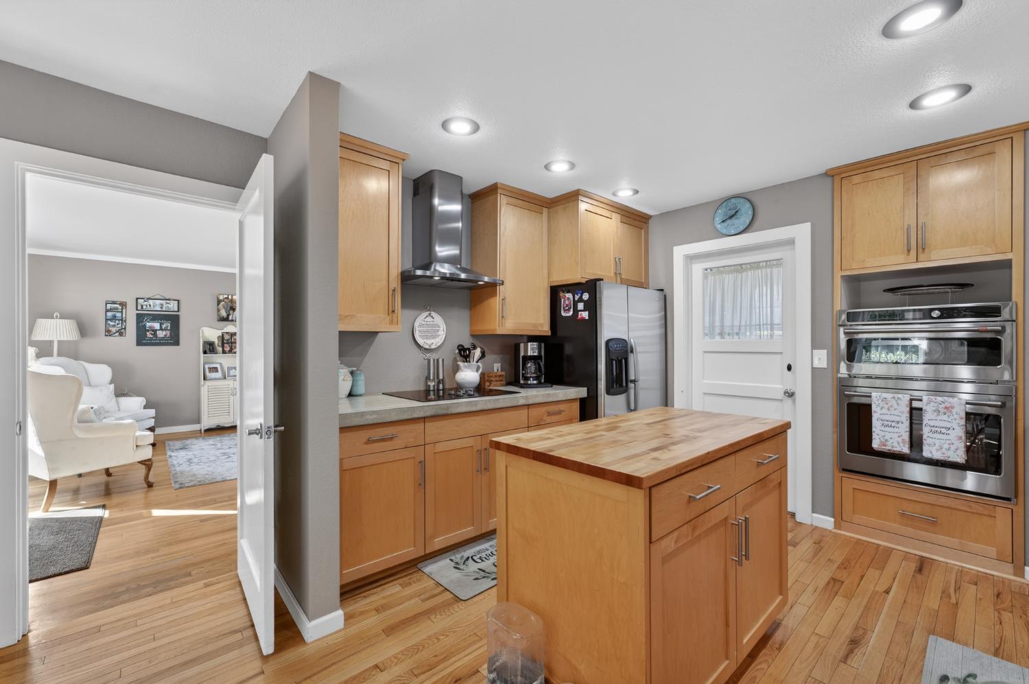 3740 Bell Road Auburn, CA 95602 - Photo 29 of 65 a kitchen with stainless steel appliances granite countertop a refrigerator and a stove top oven