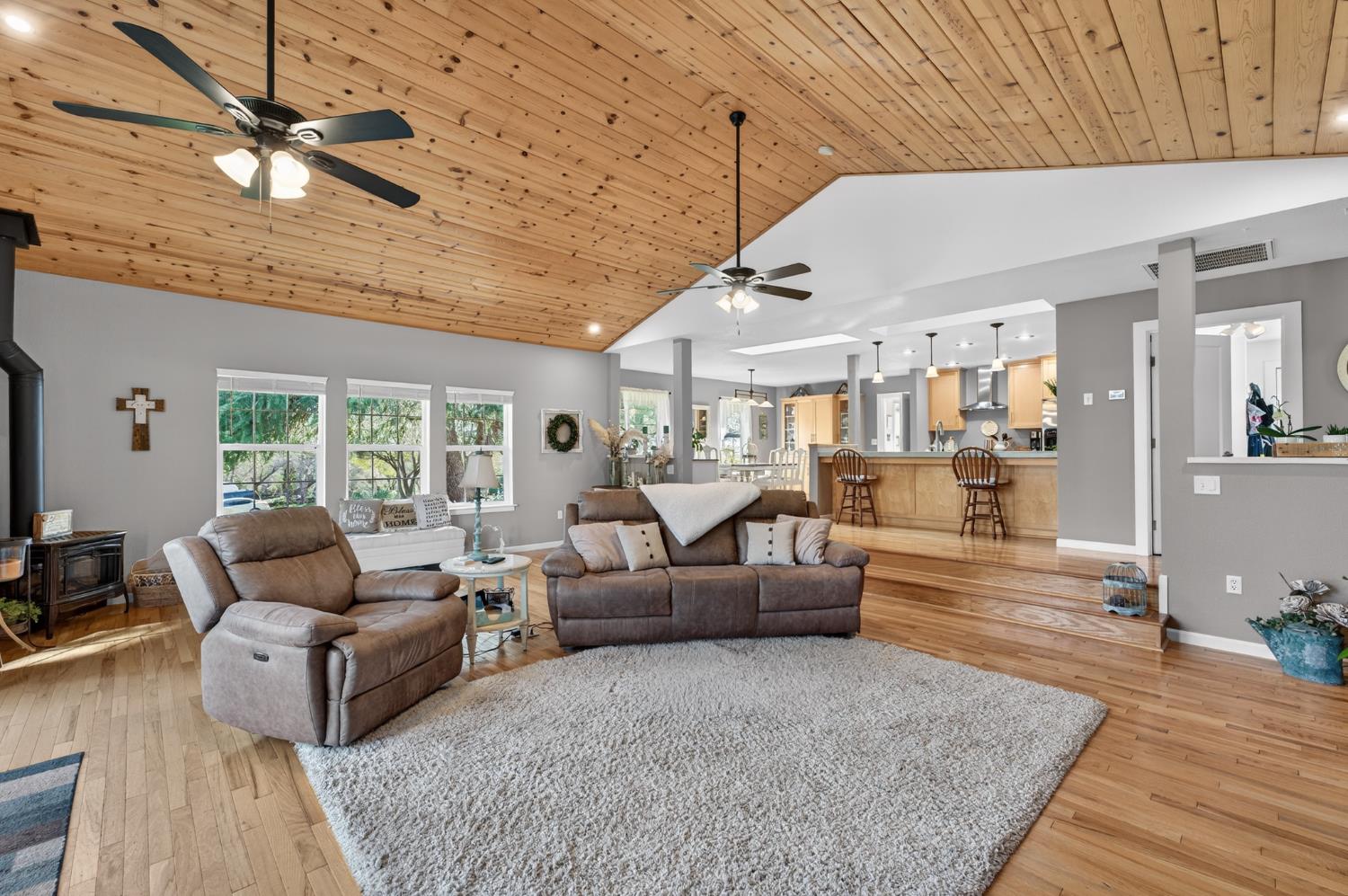 3740 Bell Road Auburn, CA 95602 - Photo 38 of 65 a living room with furniture wooden floor and ceiling fan