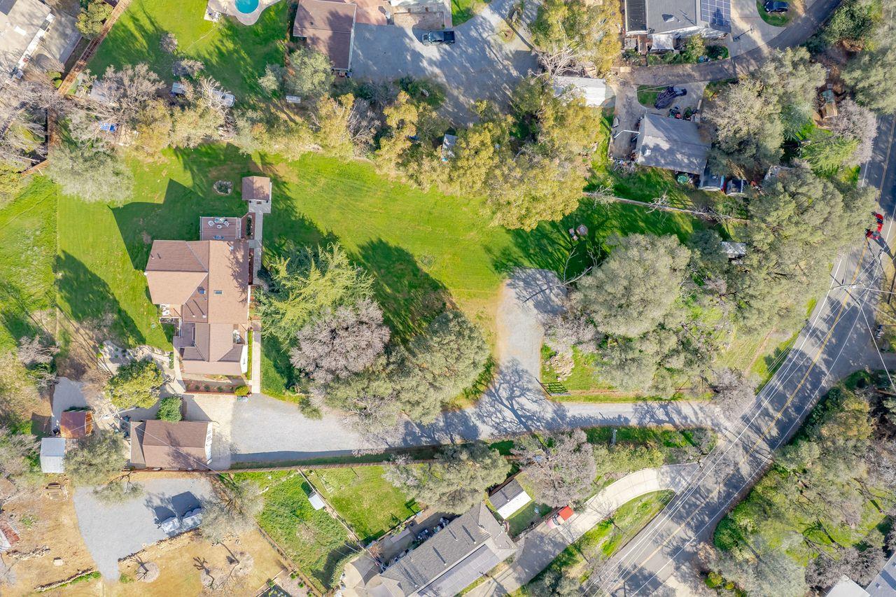 3740 Bell Road Auburn, CA 95602 - Photo 62 of 65 an aerial view of residential houses with outdoor space