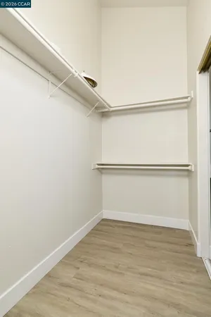 a view of an empty walk in closet