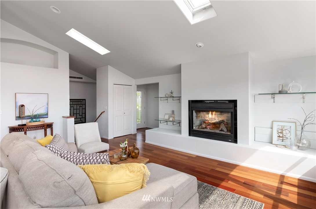 4913 Dundee Drive Anacortes, WA 98221 - Photo 12 of 40 a living room with furniture and a flat screen tv