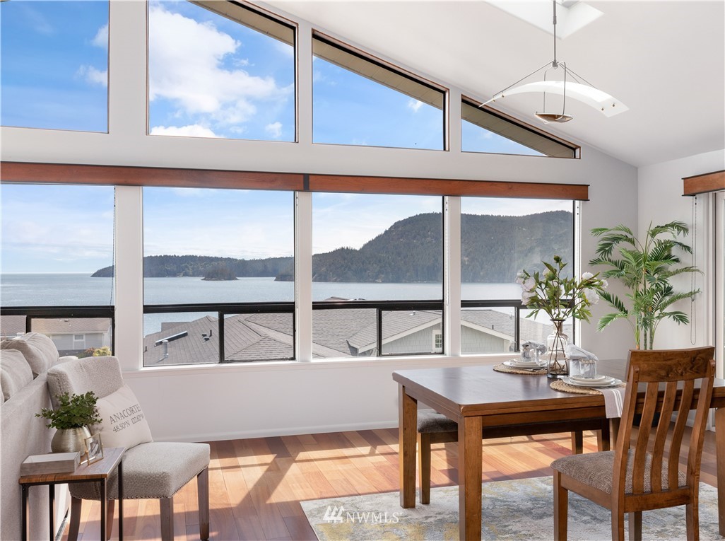4913 Dundee Drive Anacortes, WA 98221 - Photo 13 of 40 a view of a dining room with furniture window and outside view