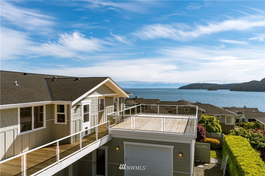 4913 Dundee Drive Anacortes, WA 98221 - Photo 3 of 40 a view of a house with a ocean view