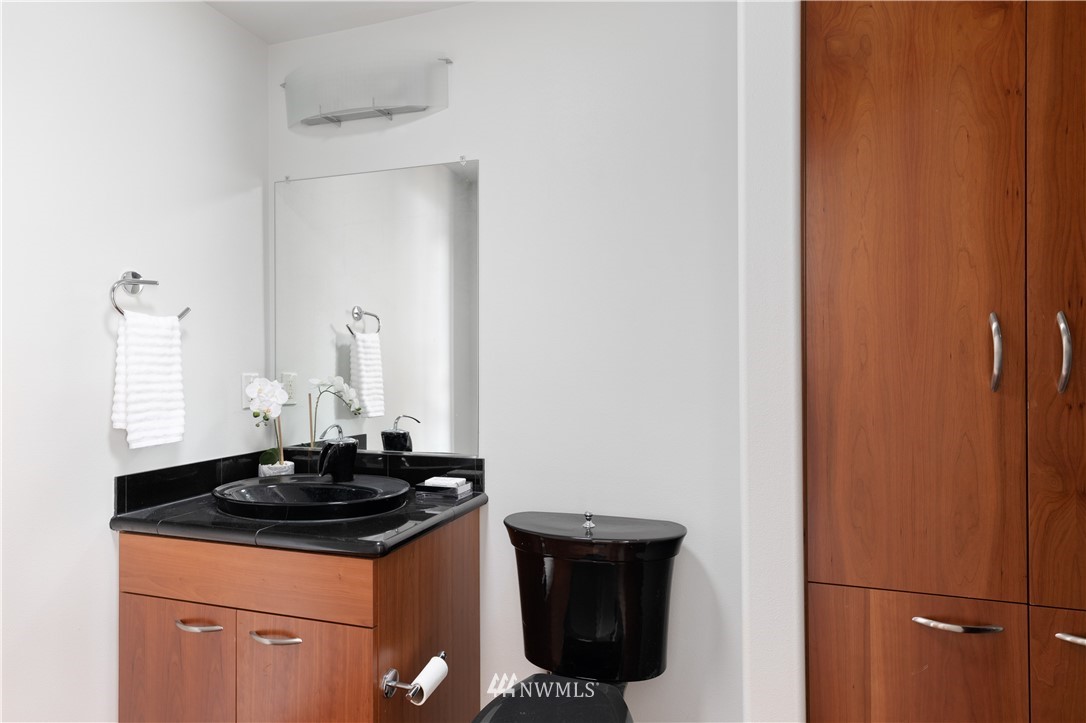 4913 Dundee Drive Anacortes, WA 98221 - Photo 25 of 40 a close view of a sink and cabinets