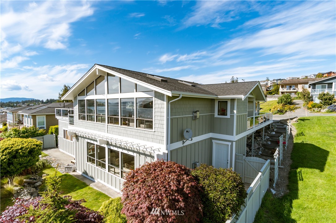 4913 Dundee Drive Anacortes, WA 98221 - Photo 39 of 40 a view of a house with a garden
