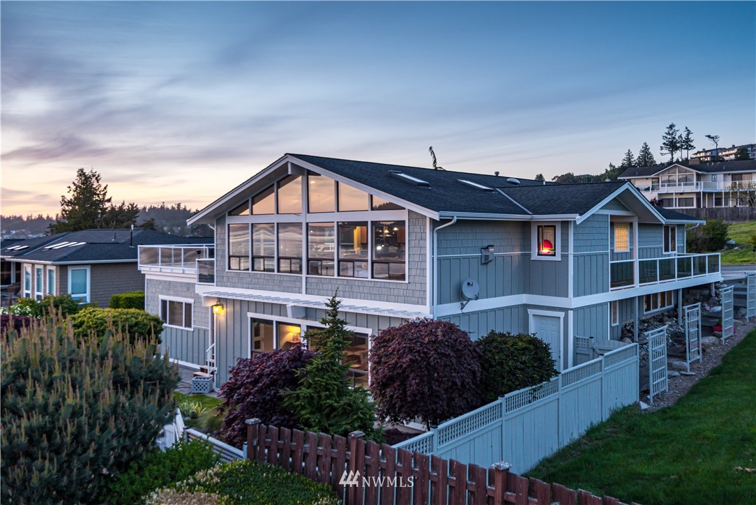 4913 Dundee Drive Anacortes, WA 98221 - Photo 40 of 40 a front view of a house with a yard