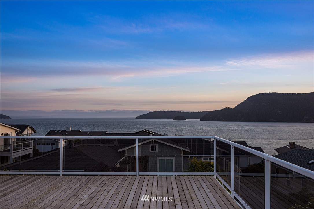 4913 Dundee Drive Anacortes, WA 98221 - Photo 6 of 40 a view of a balcony with an ocean view