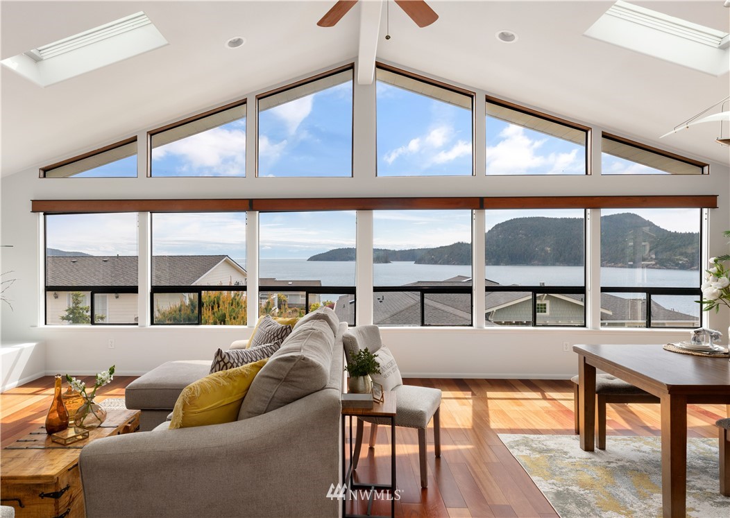 4913 Dundee Drive Anacortes, WA 98221 - Photo 9 of 40 a living room with furniture and a large window