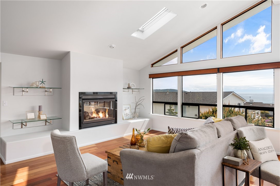 4913 Dundee Drive Anacortes, WA 98221 - Photo 10 of 40 a living room with furniture and a large window